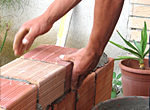 a San Leandro handyman builds a patio wall